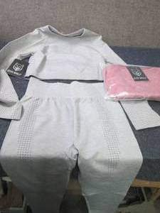 lot 438 image: 2 Medium Gym Wolf Yoga Sets...