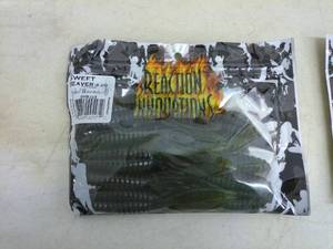 lot 92 image: Group of 17 Packaged Soft Fishing Plastics in Tackle Box - Reaction Baits