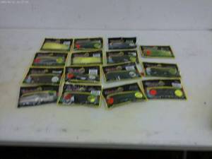 lot 125 image: Assortment of 15 Lake Fork Brand Fishing Plastics - Various Colors and Styles