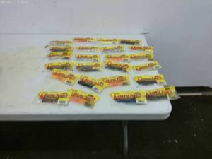 lot 131 image: Box of 24 Packaged Munchies Fishing Plastics Snack Packs