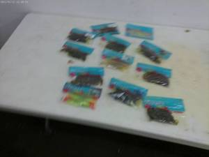 lot 144 image: Group of 12 Stanley soft Fishing Plastics - Assorted Colors