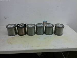 lot 224 image: Collection of 7 Triple Fish Camo Escent Fishing Lines - Various Weights
