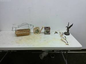 lot 280 image: Decorative Fishing-Themed Collection with Planter and Bear Canister
