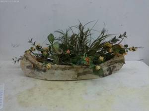 lot 283 image: Decorative Birch Bark Canoe Planter with Faux Flowers and Greenery