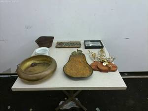 lot 292 image: Decorative Home Accent Lot including Brass Bowl, Wooden Wall Art, and Faux Pear