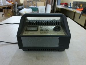 lot 417 image: Used 10 Amp Battery Charger with Clips