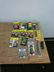 lot 513 image: Lot of Hunting Lures, Scent Sprays, and Accessories