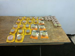 lot 520 image: Collection of 30 Hunters Scent Wafers and Western Scent Canisters