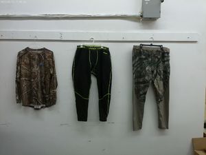 lot 561 image: Lot of 3 Camouflage Activewear 1 Long Sleeve Shirts and 2 Pair of Pants
