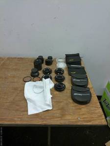 lot 689 image: Collection of Camera Lens Accessories and Filters with Tiffen and Century Optics Pouches