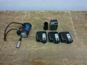 lot 703 image: Lot of 3 PocketWizard FlexTT5 Transceivers with Canon SF-200 Sports Finder