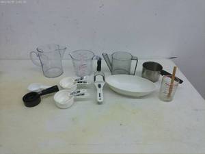 lot 330 image: Kitchenware Collection including Measuring Cups, Spoons, and Liquid Measuring Jugs