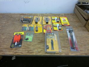 lot 509 image: Lot of Hunting Accessories including Scents, Attractants, and Tools