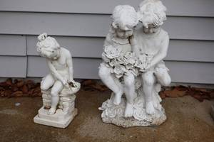 lot 37 image: Lawn and Garden Statues of Concrete Cherub and Resin BoyGirl