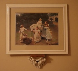 lot 93 image: Vintage Victorian Home Accents Framed Wall Art Children Playing Print w Cherub Wall Sconce Shelf