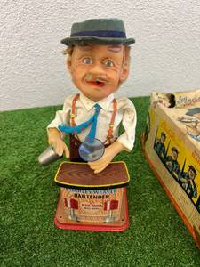 lot 63 image: Charley Weaver Bartender with Box