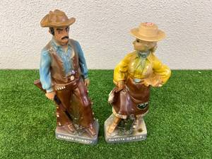 lot 64 image: Dakota Cowboy & Dakota Cowgirl Decanters