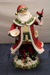 lot 27 image: Hand Painted Chestnut Santa Figurine Holding Cardinal and Bowl - Beautifully Detailed