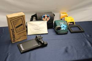 lot 180 image: Vintage Polaroid Camera Bundle - Includes Film Holder, Camera Bag, Kodak Film