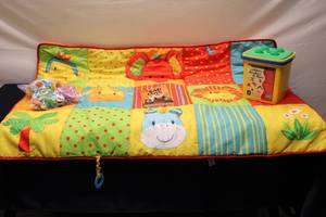 lot 217 image: Colorful Baby Play Mat with Toy Storage, Book, and Accessories