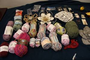 lot 230 image: Crafting Supplies Assortment - Yarn, Beaded Cardinal, Floral Accessories, and More