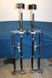 lot 287 image: Pair of Used Adjustable Spring-Loaded Stilt Lifts