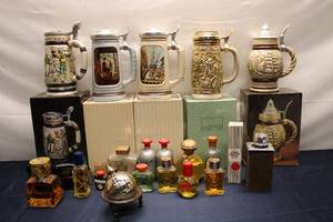 lot 297 image: Collection of 5 Decorative Beer Steins and Assorted Avon Fragrances