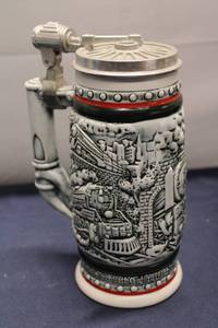 lot 328 image: Vintage 1982 Avon Handcrafted Ceramic Stein - Train Design