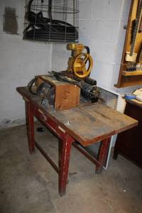 Vintage General Grinder and Riverside Air Compressor Setup on Workbench