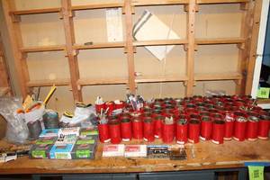 Assortment of Fasteners and Tools in Red Cans - DIY Hardware Supply