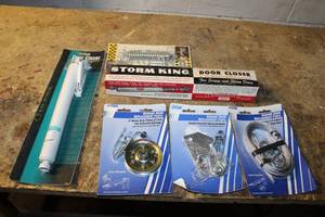 Assortment of Garage Door Replacement Parts - Includes Door Closer, Safety Chain, and Extension Cables
