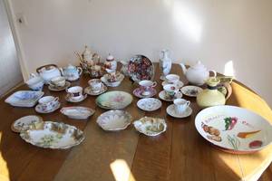 Collection of Vintage Tableware Including Plates, Bowls, and Cups
