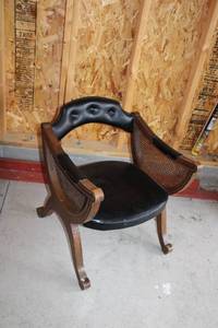 Vintage Wooden Accent Chair with Black Upholstered Seat and Caned Sides