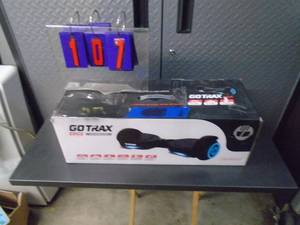 Go Trax edge hover-board Looks new in box with charger. Powers up. As shown.