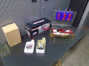 Tom Hoover funny car signed with John Force collectible. As shown.
