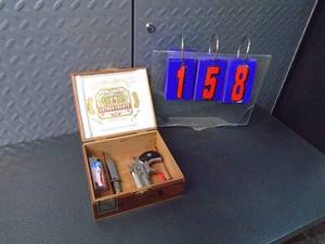 Cigar box with contents. As shown.