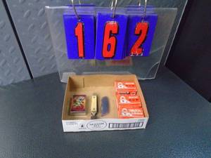 Flat of new lighters & knives. As shown.
