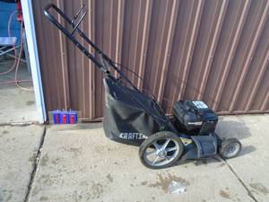 Craftsman 6.0 HP mulche series mower with bagger. Used condition. Tested & works. As shown.