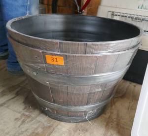 Two New 22 inch planter barrels, 14 in tall, plastic