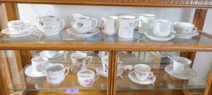 lot 6 image: Collection of cup and saucer sets and mustache cups and plates