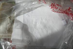lot 17 image: Group of freshly dry cleaned table cloths