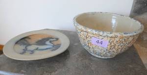 lot 44 image: Pottery bowl and Plate with a rasied horse design