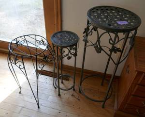 lot 50 image: THREE metal plant stands 22 and 30 inches tall