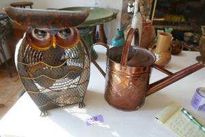 lot 58 image: Copper Owl fan and copper watering can