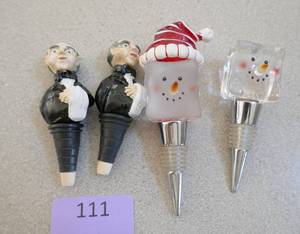 lot 111 image: Fun group of 4 bottle toppers