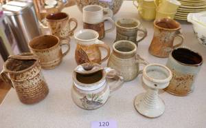lot 120 image: Group of Eleven pottery mugs