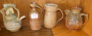 lot 124 image: FOUR pottery pitchers and teapots