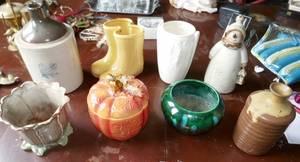 lot 147 image: Misc pottery dcor - snowman, pumpkin, rain galoshes
