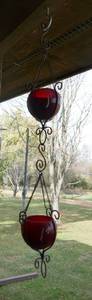lot 152 image: Group of bird feeders on the porch