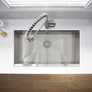 lot 11 image: Kohler Pro-Inspired Stainless Steel Kitchen Sink Kit With Sink, Faucet, Bamboo Cutting Board, Silicone Mat, Drain Strainer & Hardware